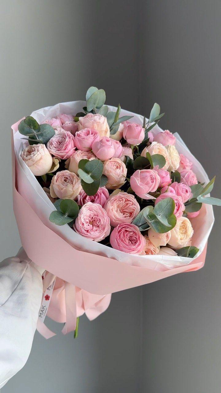 Professional floral arrangement in modern corporate setting